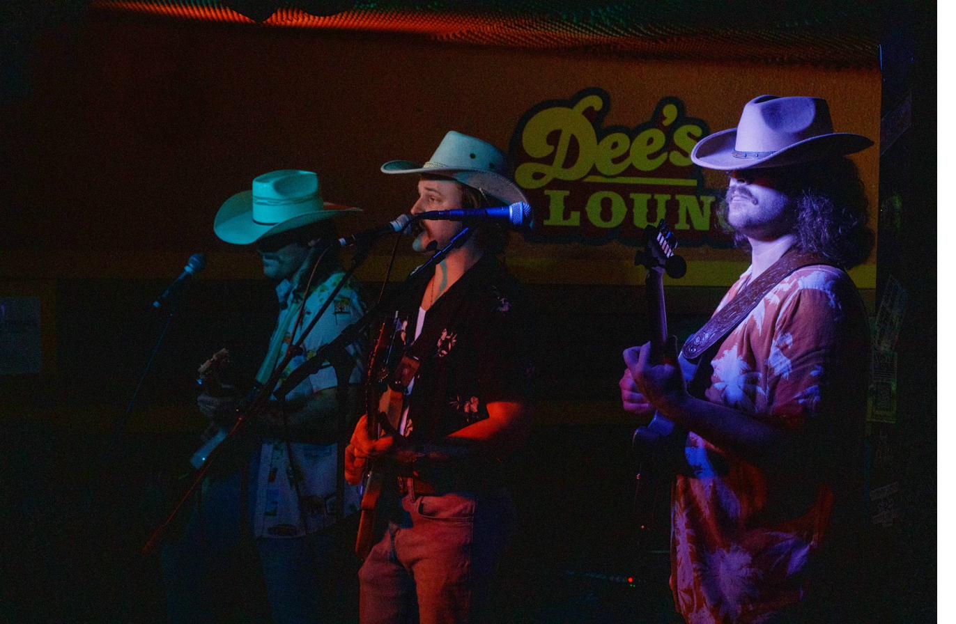 Auntie Aircraft performing live — Austin, Troy, and Chayton on stage